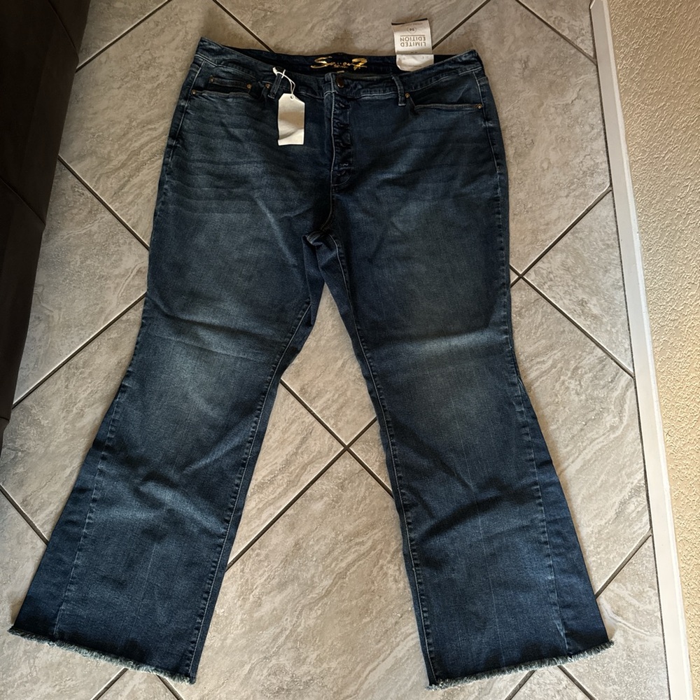 Seven7 Dark wash flared jeans with frayed hem